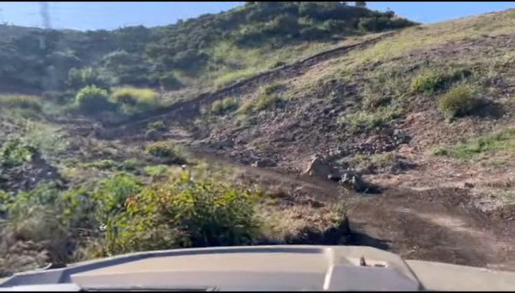 UTV path going up the mountain, fighting to some.